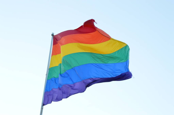rainbow flag in front of the sky - Photo, Image