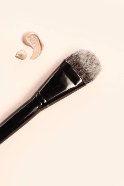Cosmetic foundation cream and powder with brush - Fotoğraf, Görsel