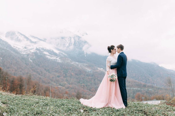 modern wedding in the mountains in Sochi and the sea, a wedding in a European style by ca - Φωτογραφία, εικόνα