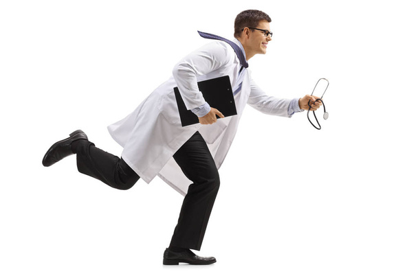 Doctor with a clipboard and a stethoscope running - Fotó, kép