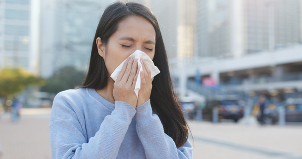 Woman runny nose at outdoor  - Photo, Image