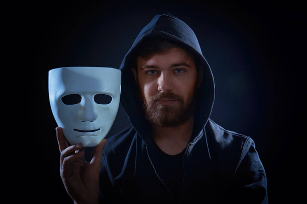 Hacker with mask in darkness - Фото, зображення