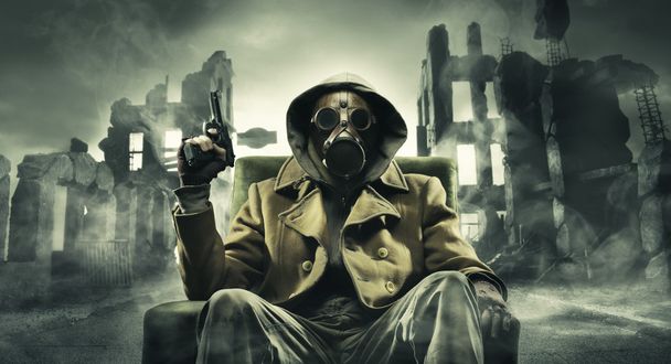 Post apocalyptic survivor in gas mask - 写真・画像