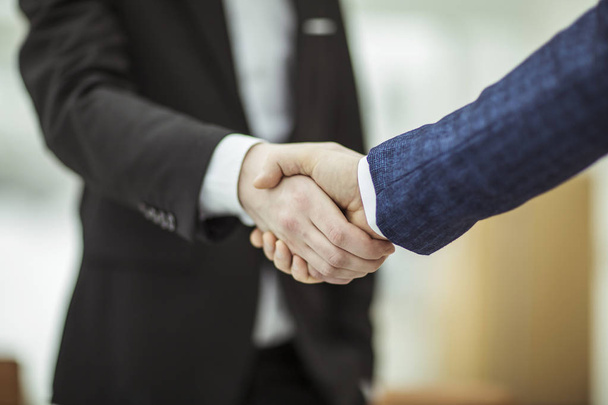 concept of a reliable partnership : a handshake of business partners - Fotó, kép
