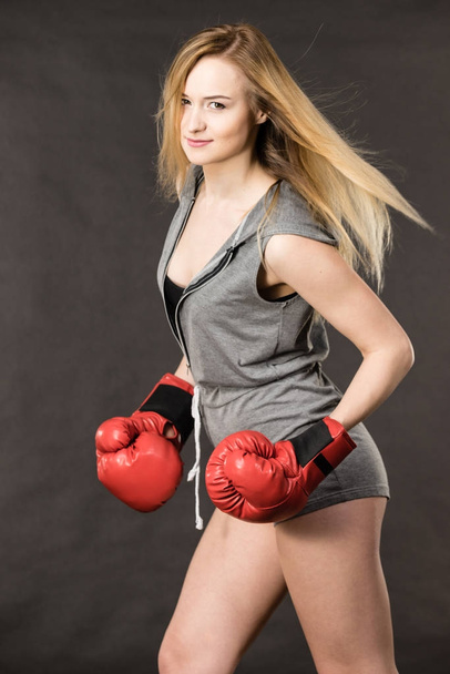 Beautiful woman with red boxing gloves - Photo, Image