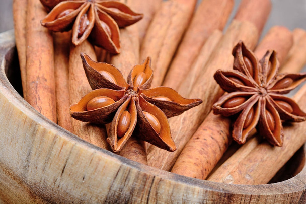 Star anise with cinnamon in a bowl - Photo, Image