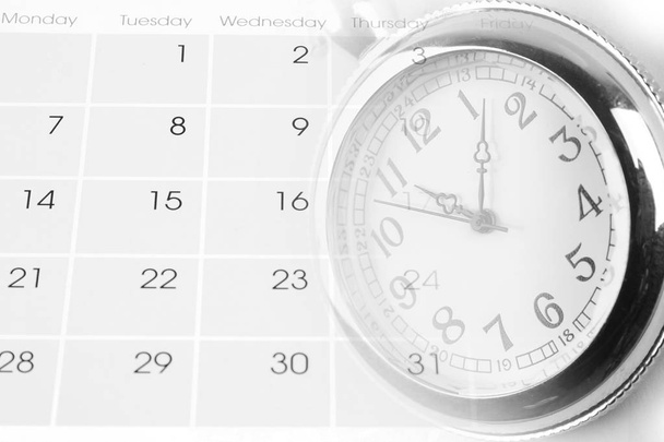 Reloj en calendario
  - Foto, Imagen