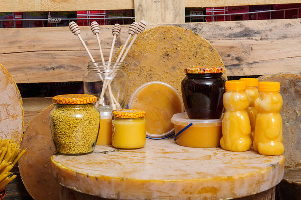Various bee products - honey, honey with wax and propolis. Products of livelihoods of bees. Wax. Cells. Honey.Beekeeping. - Photo, Image
