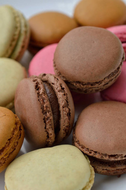 colorful macaroons on a white plate - Photo, image