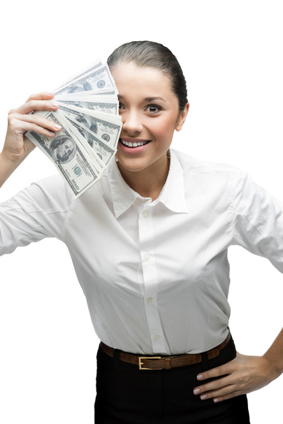 Thoughtful businesswoman holding money - Photo, image