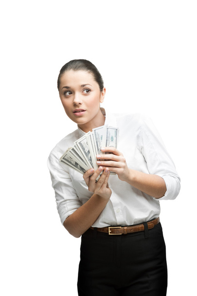 Thoughtful businesswoman holding money - Foto, immagini