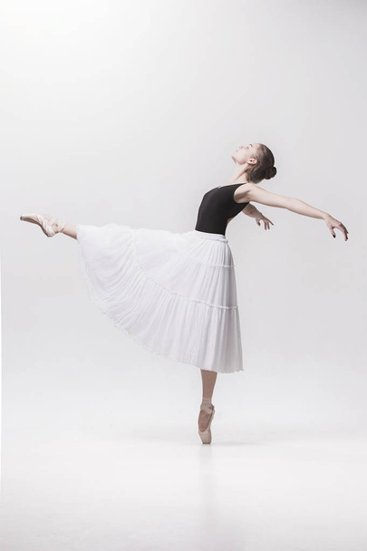 Young classical dancer isolated on white background. - Valokuva, kuva
