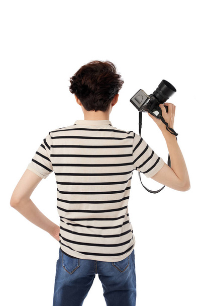 Rear view of photographer with camera, isolated on white - Fotoğraf, Görsel