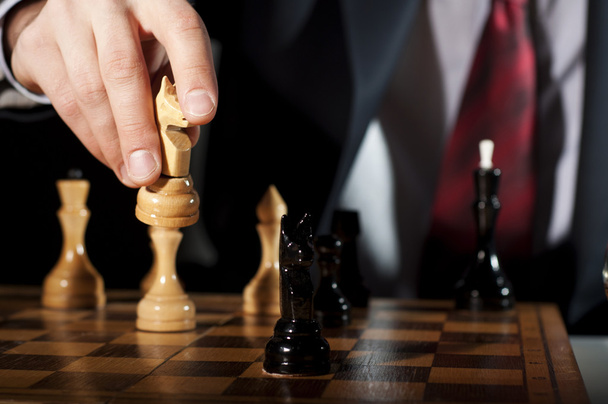 Businessman plays chess - Φωτογραφία, εικόνα