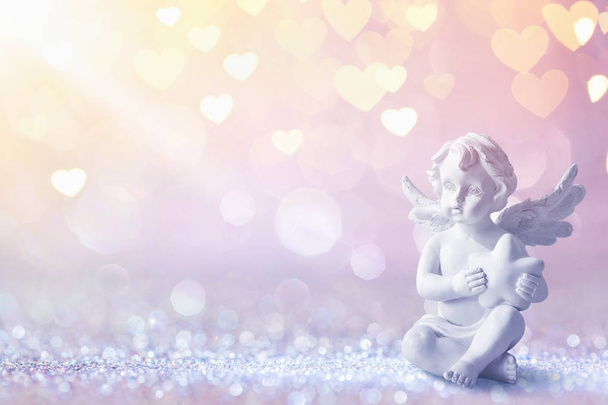 Greeting Card With Cupid On Shiny Background - Фото, изображение