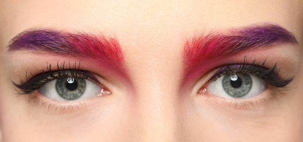 Young woman with dyed eyebrows, closeup - Photo, Image