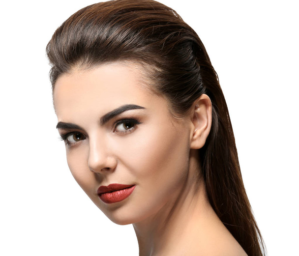Young woman with beautiful eyebrows on white background - Zdjęcie, obraz