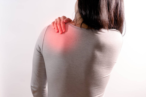 the women suffer from  neck/shoulder injury/painful after working - Photo, Image