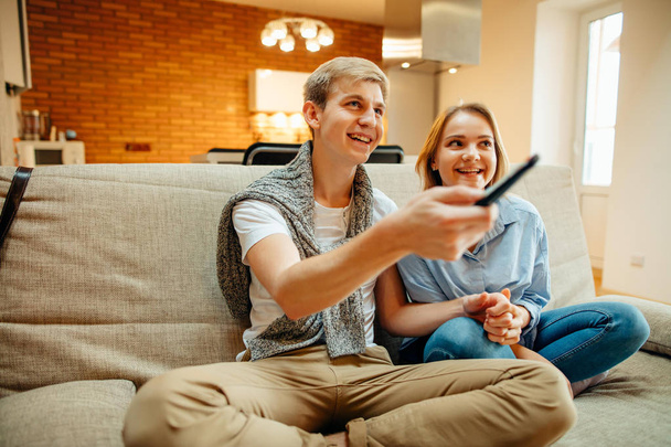 Couple Watching Movie On Television At Home - Photo, Image