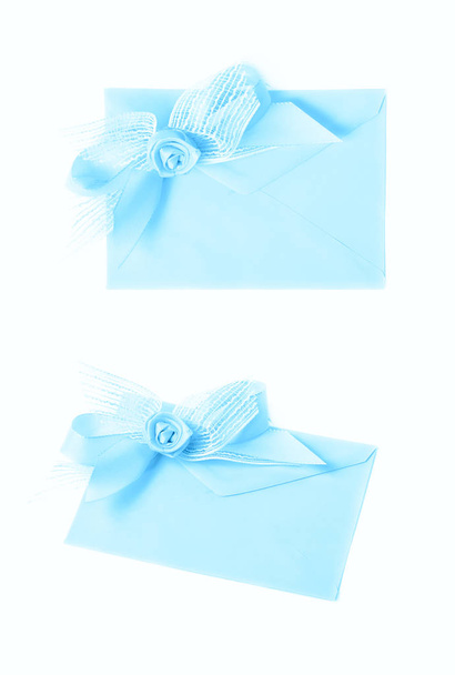 Paper envelope decorated with the bow - Zdjęcie, obraz
