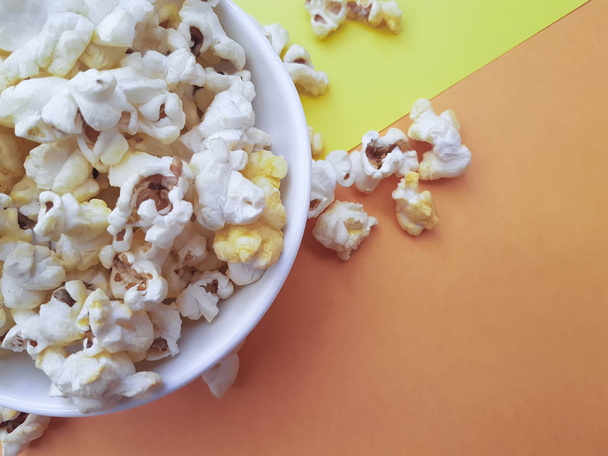 popcorn on a colored background - Photo, Image