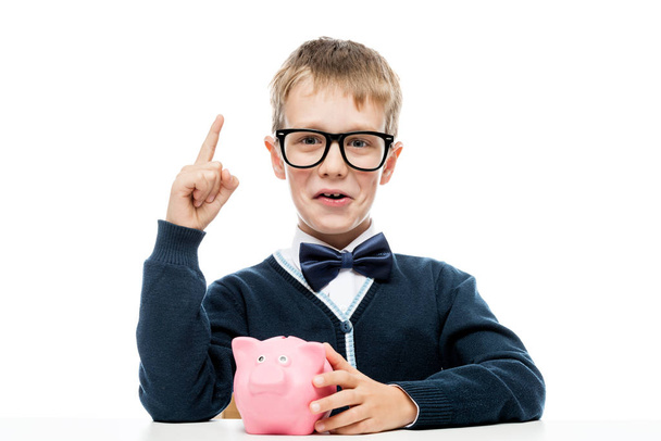 smart boy with a piggy bank came up with an idea, a portrait is  - Photo, Image