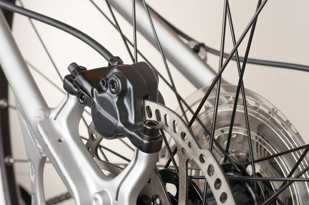 Hydraulic rear disc brake of mountain bike, close up view - Photo, Image