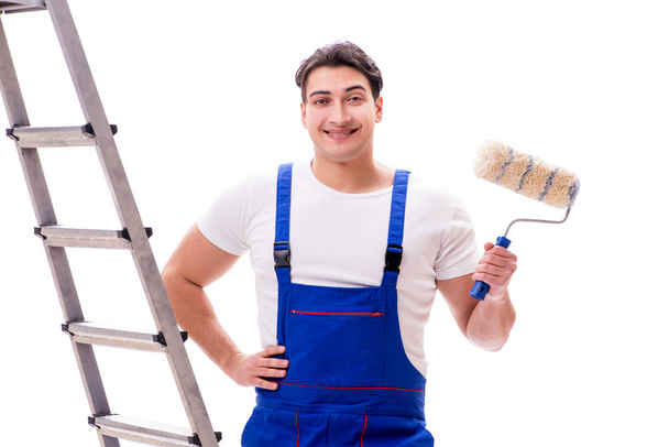 Young painter man with ladder isolated on white background - Foto, imagen