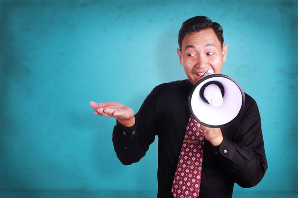 Young Man Shouting with Megaphone, Promotion Concept - Photo, Image