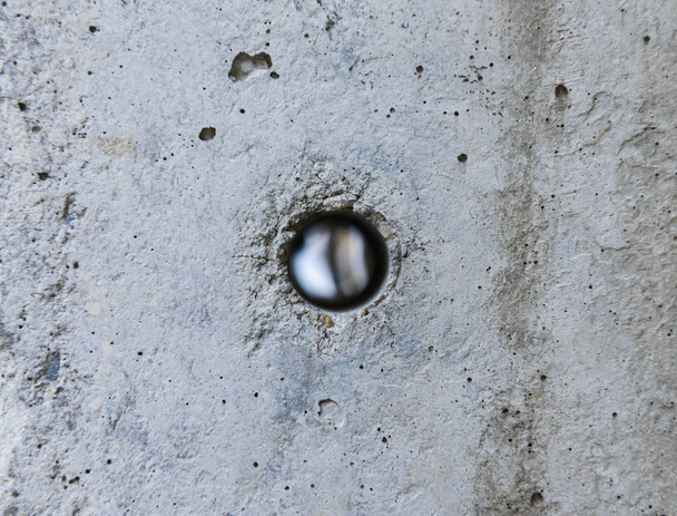 Hole in the concrete from electricity post - Photo, Image