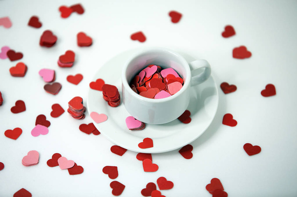 Valentinky den srdce pozadí s já tebe taky "Miluji tě", šálek čaje, skrývá tajemství v poháru, valentine karty pozadí - Fotografie, Obrázek