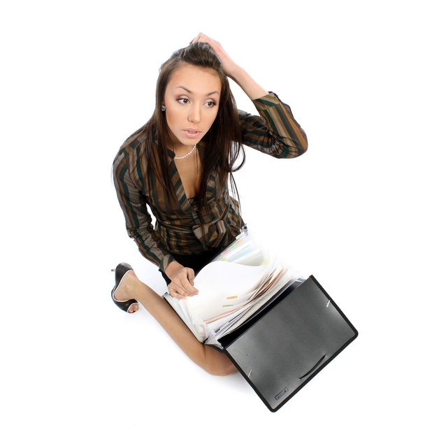 Belle femme d'affaires brune avec un dossier de documents
 - Photo, image