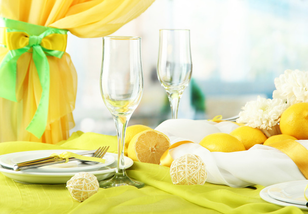 beautiful holiday table setting with lemons, close up - Фото, зображення
