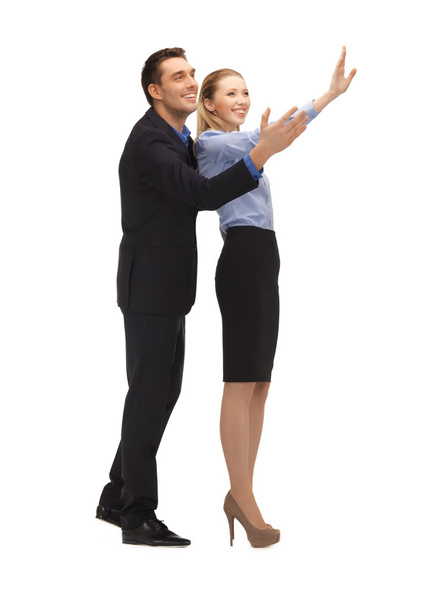 Man and woman making a greeting gesture - Foto, imagen