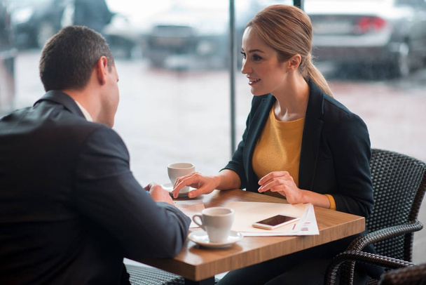 Beaming woman taking over agreement with partner - Photo, image