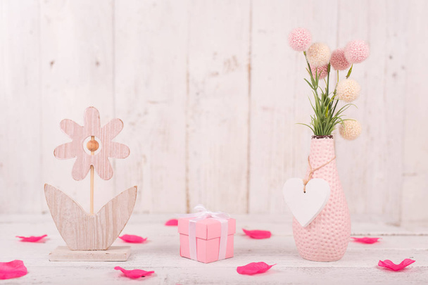 Flowers composition for Valentines, Mothers or Womens Day. Pink flowers on old white wooden background. - Foto, Imagen