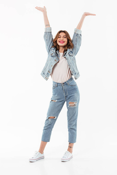 Full length image of Happy woman in denim clothes - Foto, immagini