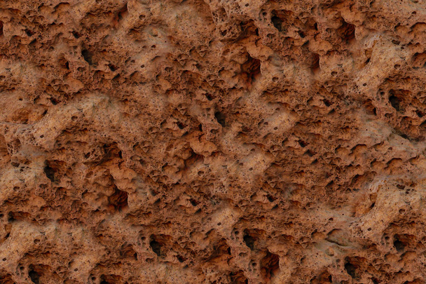 гранж природного фона, текстура земли выветренный известняк с кратерами
 - Фото, изображение