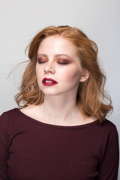 Sensual portrait of redheaded woman with closed eyes - Foto, imagen