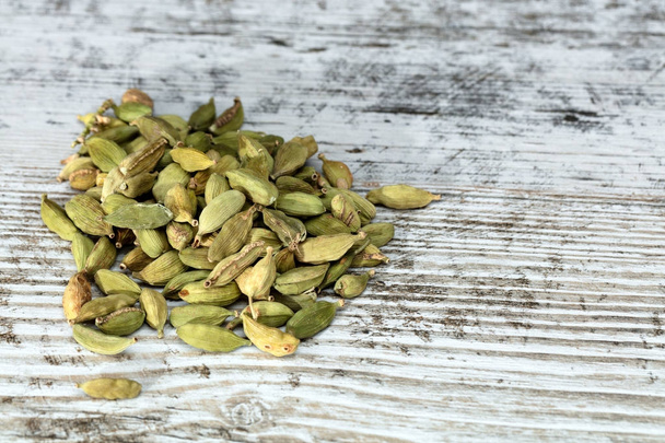 cardamom seeds on a white table - Photo, Image