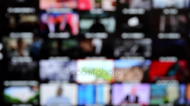 Mosaico de canales de televisión, Elija entre miniaturas en una televisión. Fondo borroso
 - Imágenes, Vídeo