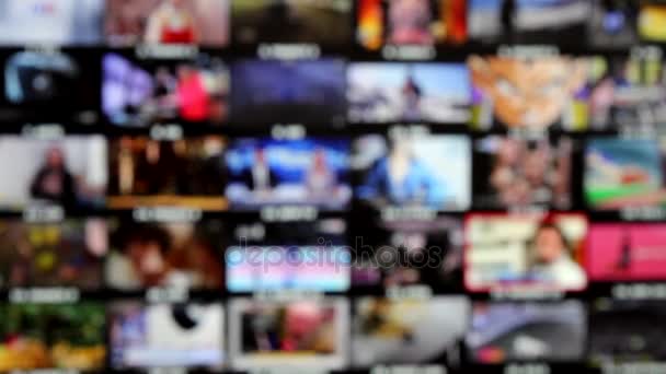 Mosaico de canais de TV, Escolha entre miniaturas em uma televisão. Contexto desfocado
 - Filmagem, Vídeo