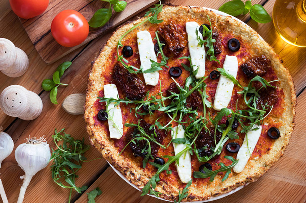 Gluten-free grain-free pizza made from cauliflower and almond fl - Photo, Image