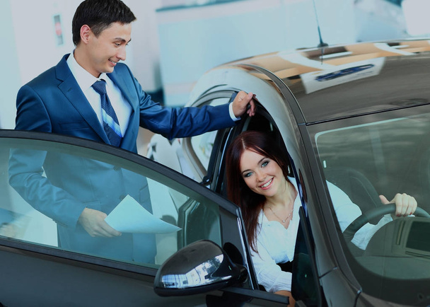 Woman buying a new car - Photo, Image