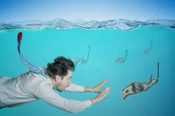 Greedy businessman is swimming in water and catching money on ba - Photo, Image
