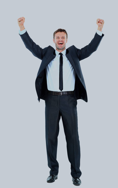 Excited handsome business man with arms raised in success. - Foto, Imagen