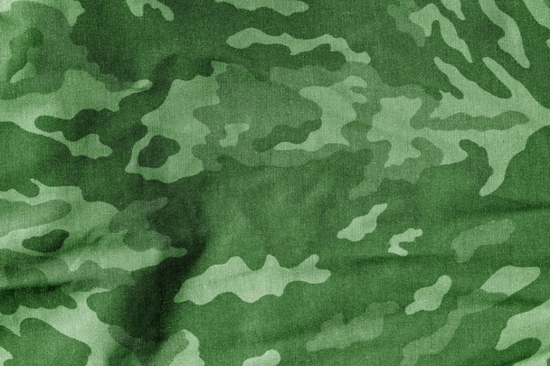 Vojenská uniforma vzor s efekt rozostření v zeleném tónu. - Fotografie, Obrázek
