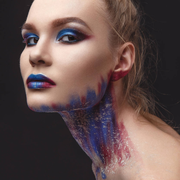 Portrait of beautiful girl with blue tones makeup - Photo, image