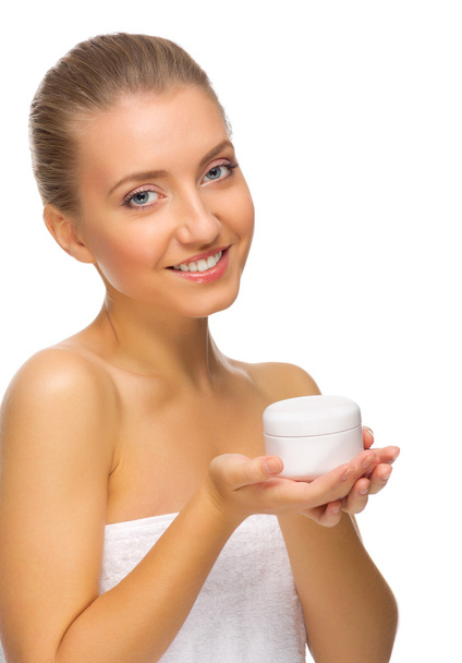 Young healthy girl with body cream jar - Foto, Imagem