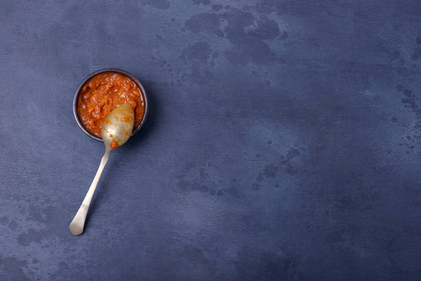 Sauce in bowl with spoon - Photo, Image